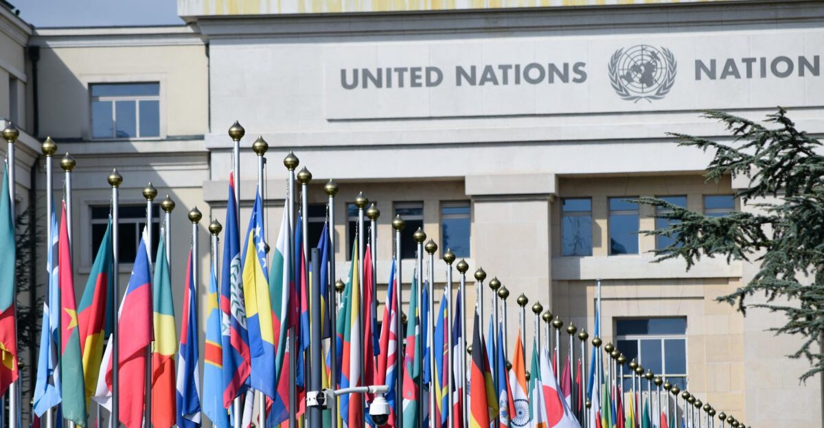 Colorful flags outside the United Nations office in Geneva symbolizing global unity