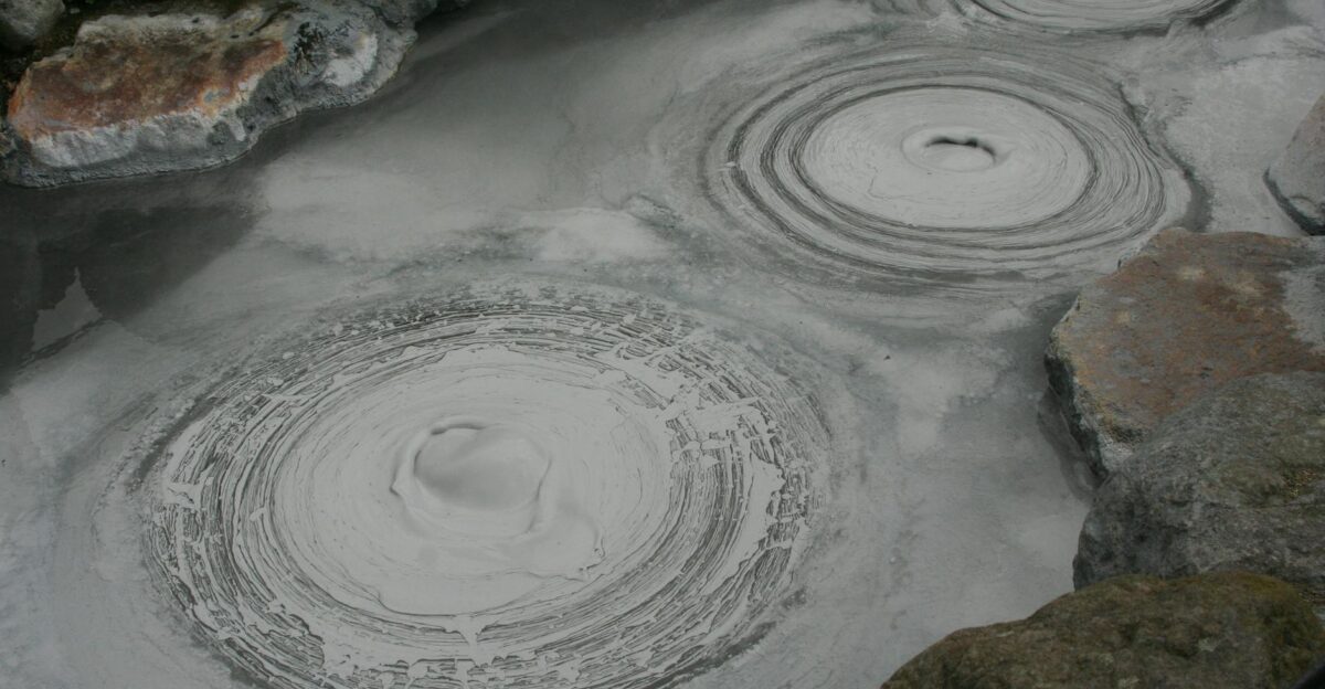 Captivating image of bubbling mud pools in Beppu a renowned geothermal area in Japan
