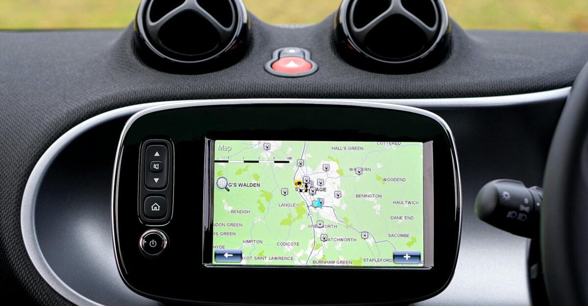 Close-up view of a modern car dashboard featuring a GPS map for navigation