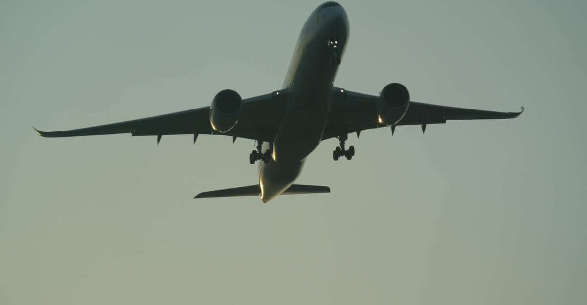 Silhouette of an airplane flying during dusk in Addis Ababa Ethiopia