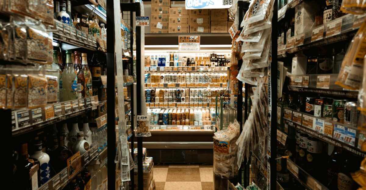 Explore a bustling Tokyo convenience store aisle packed with diverse products and merchandise