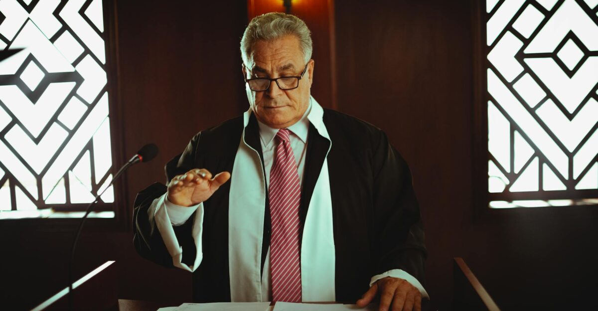 Mature male judge in a courtroom taking an oath Baghdad Iraq