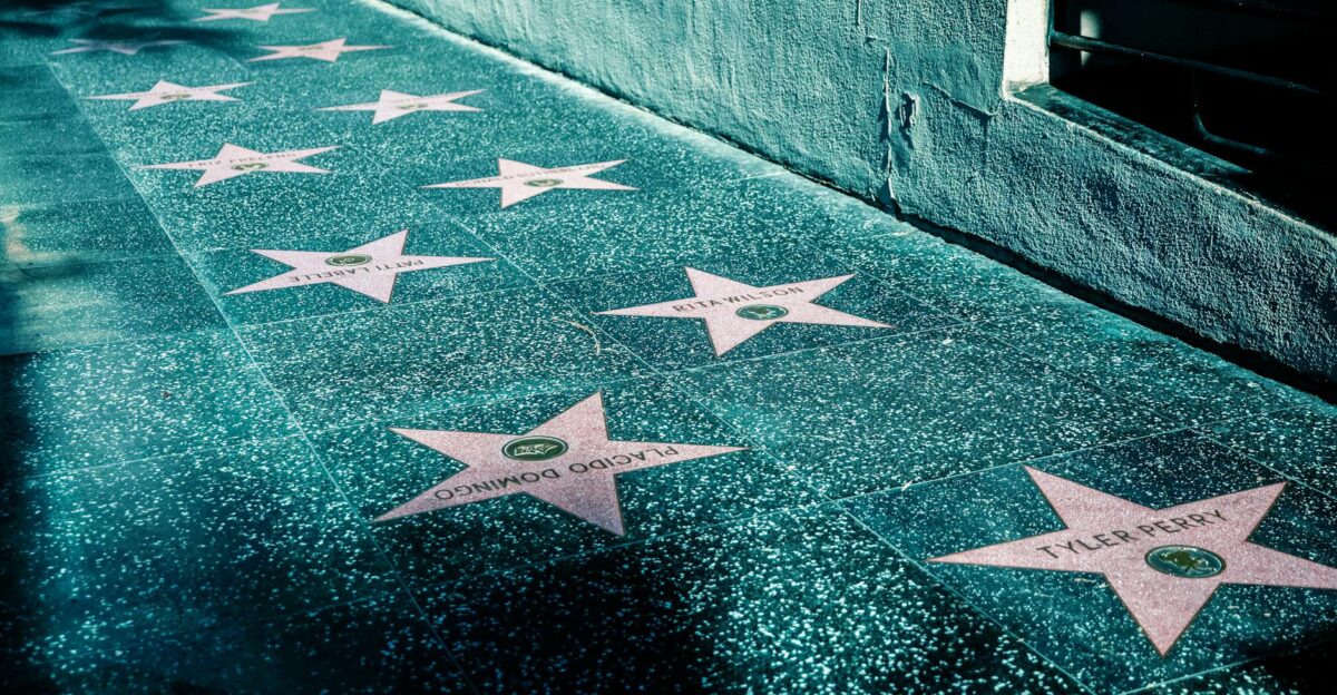 View of Hollywood Walk of Fame with stars on the sidewalk in Los Angeles California