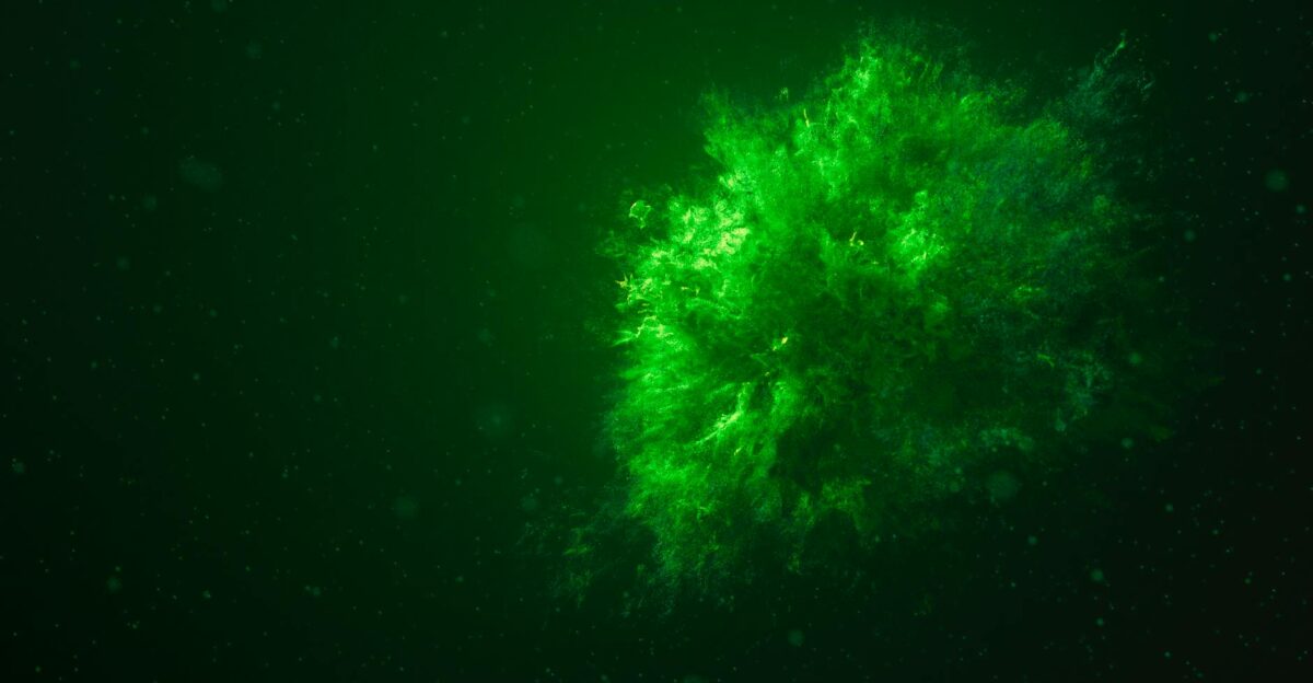 A vivid underwater green explosion creating a stunning abstract visual effect