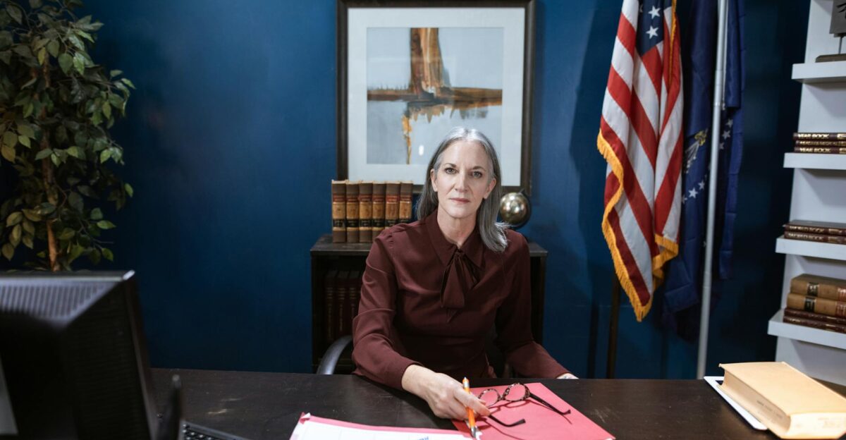 Professional woman in an office representing leadership and authority