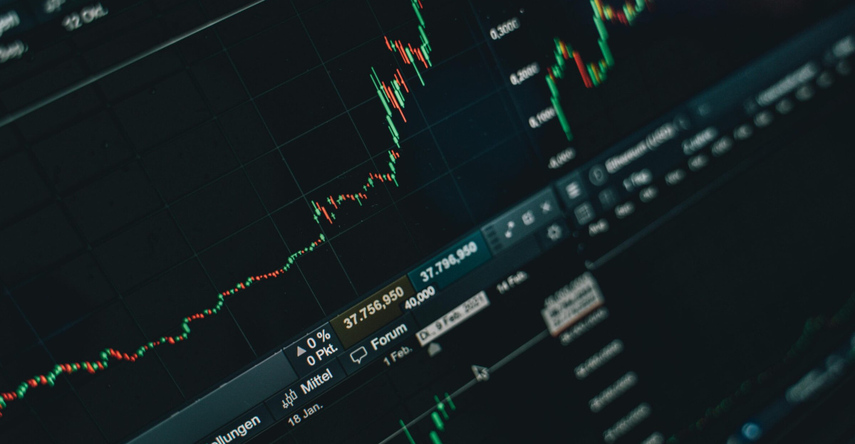 Close-up of stock market trading screen displaying financial growth and charts.