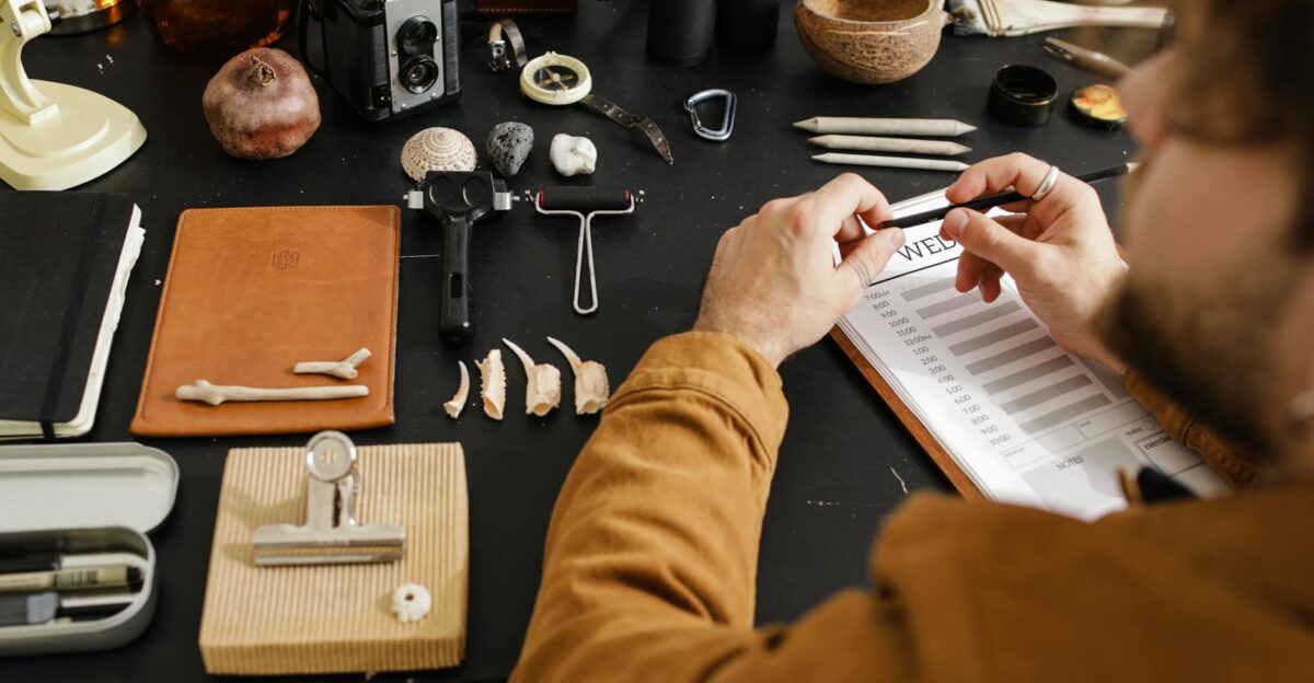 An archaeologist meticulously studies various fossils highlighting detailed research and examination