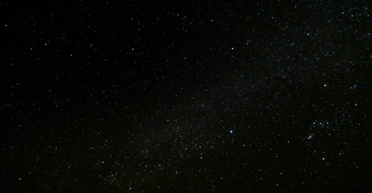 Capture of the starry night sky over Ksar Tanamouste, Morocco, showcasing a vibrant universe.