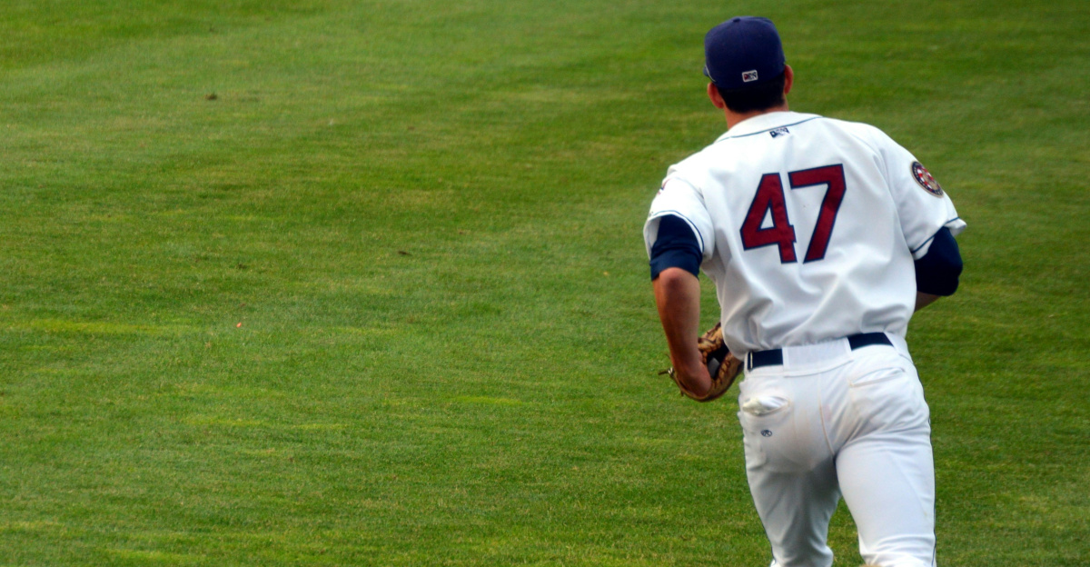 baseball player 47 running in field