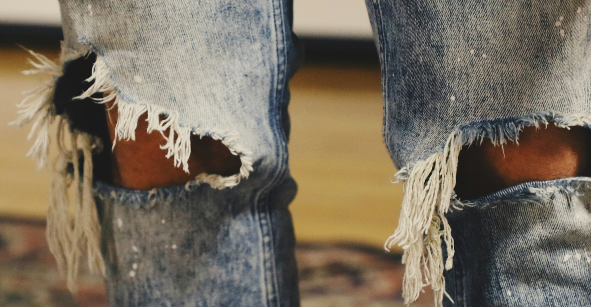 person standing on floral area rug