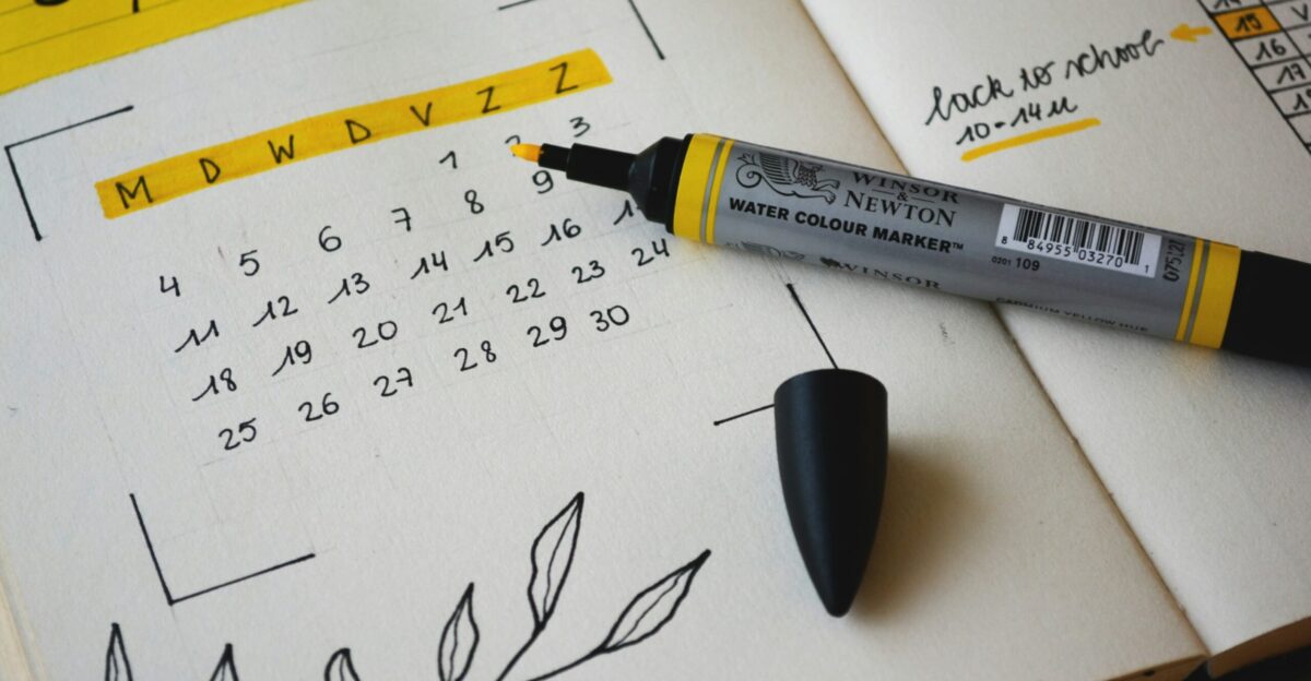 black marker on notebook