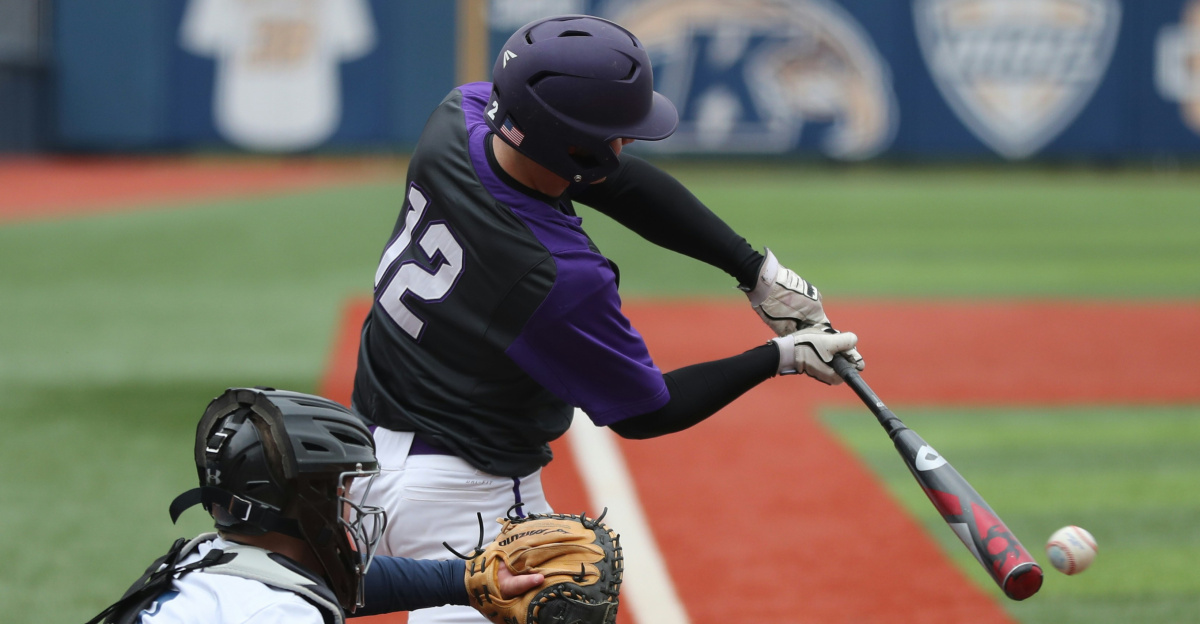 baseball player swinging bat
