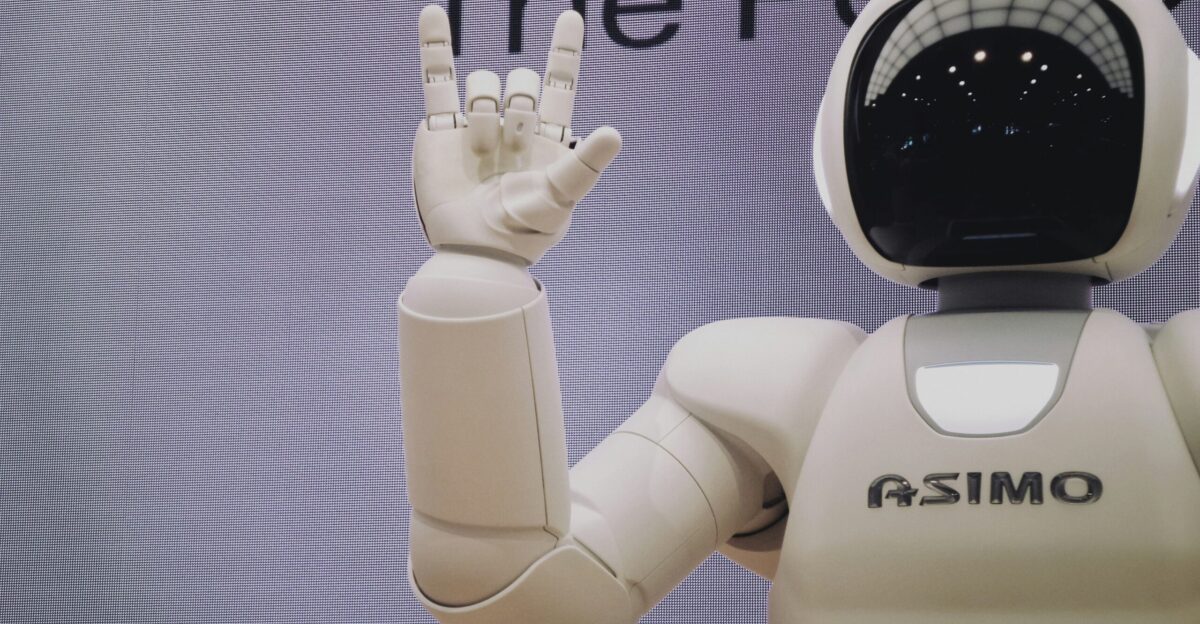 Asimo robot doing handsign