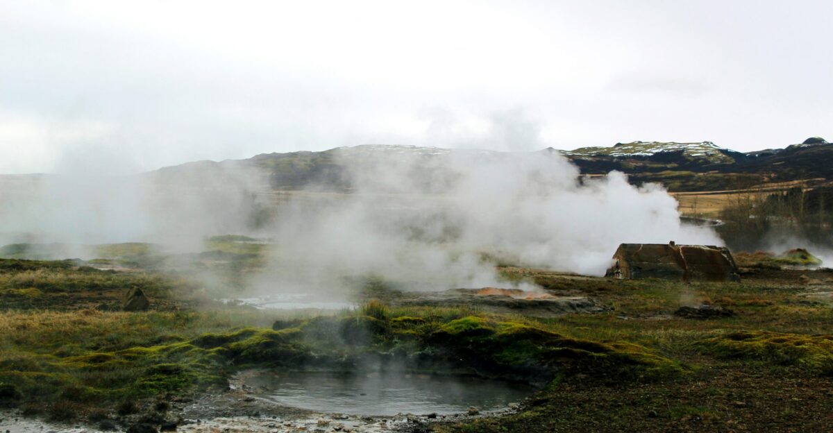 photo of land covered by smoke
