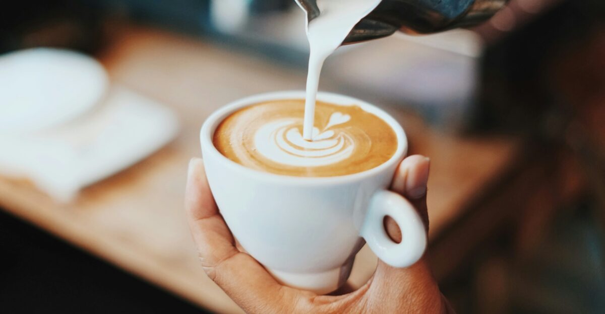 person making latte art