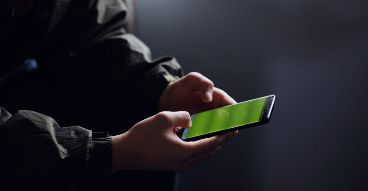 person holding black smartphone