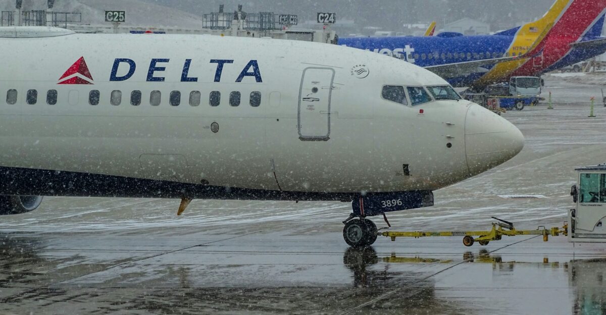 white Delta passenger plane