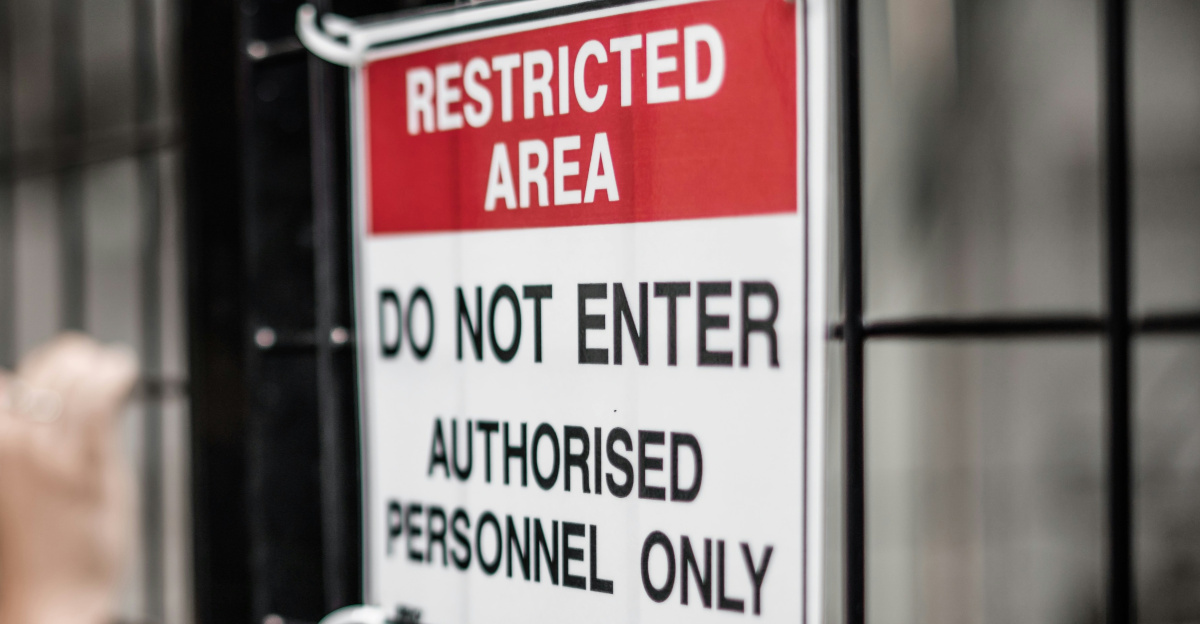 Restricted Area sign at the cyclone fence