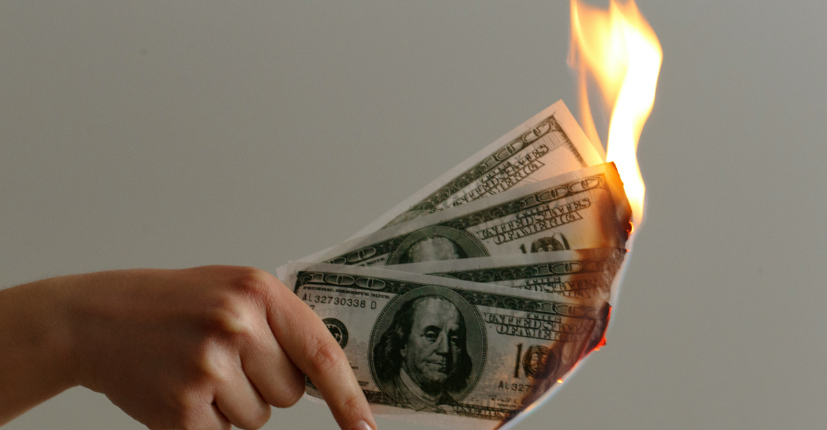 burned 100 US dollar banknotes