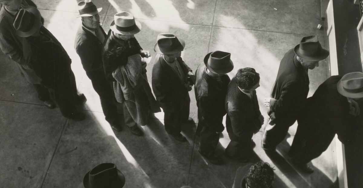 grayscale photography of people in line