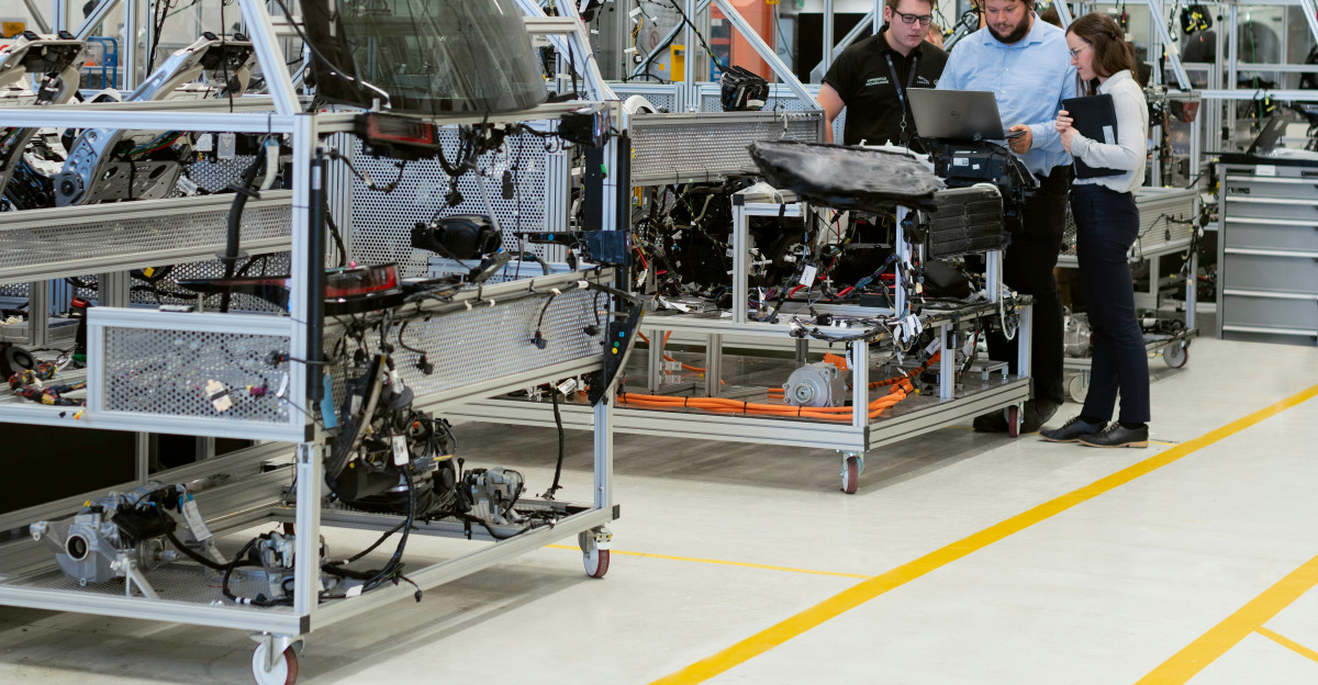 man in black jacket sitting on black chair