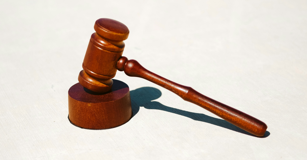 brown wooden tool on white surface