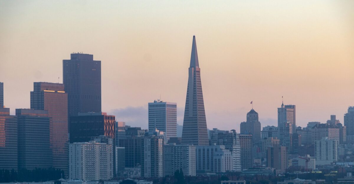 city skyline under white sky during daytime