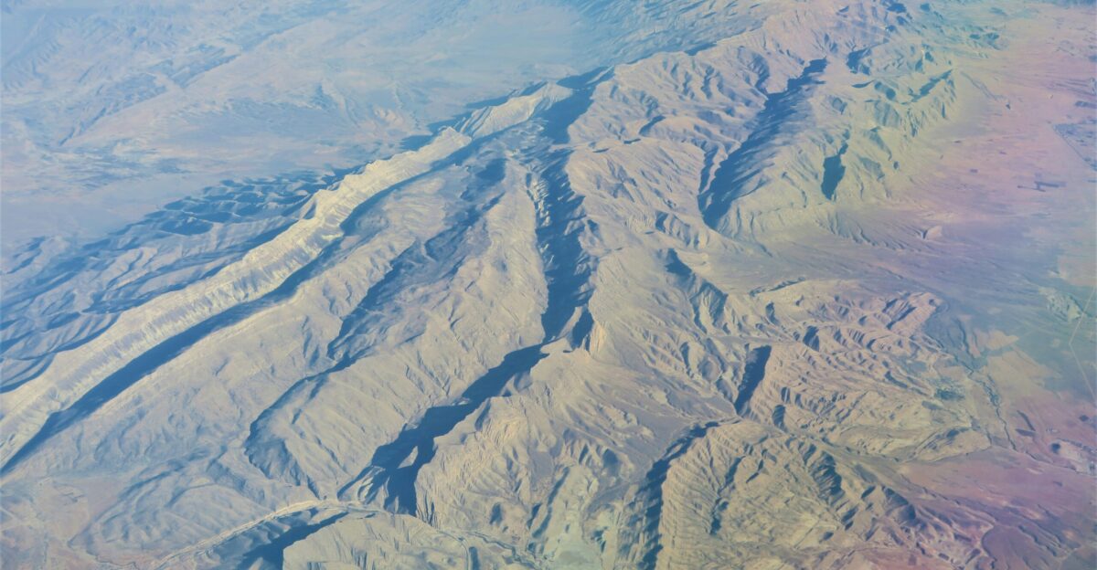 aerial view of snow covered mountains during daytime