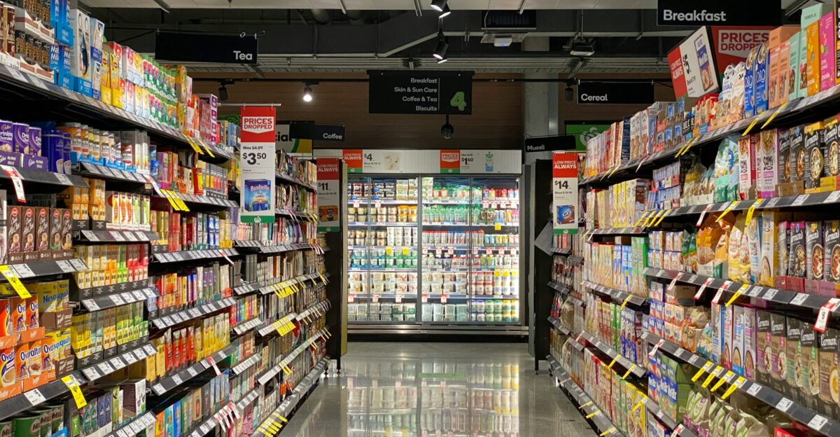 white and red labeled pack on white shelf