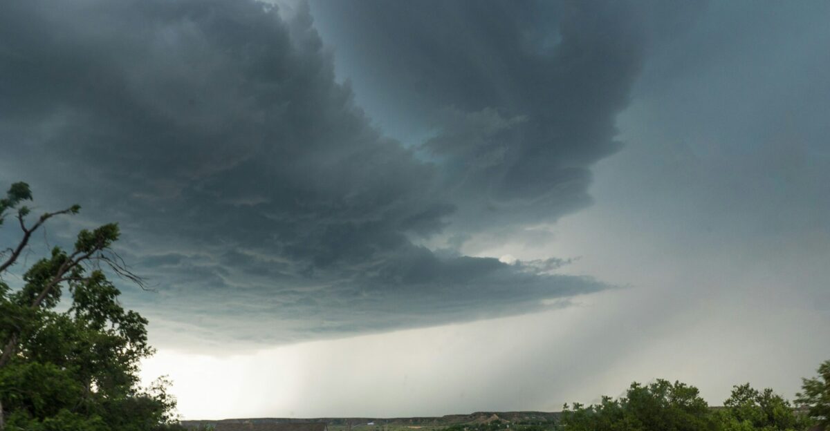 white and brown houses under gray clouds