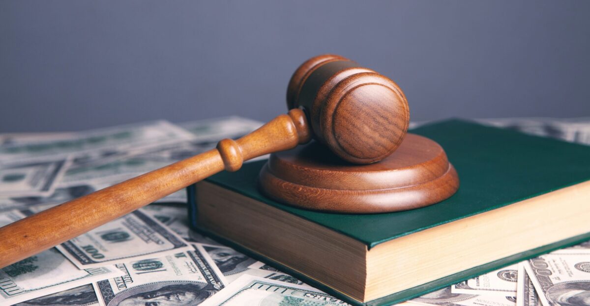 brown wooden chess piece on brown book