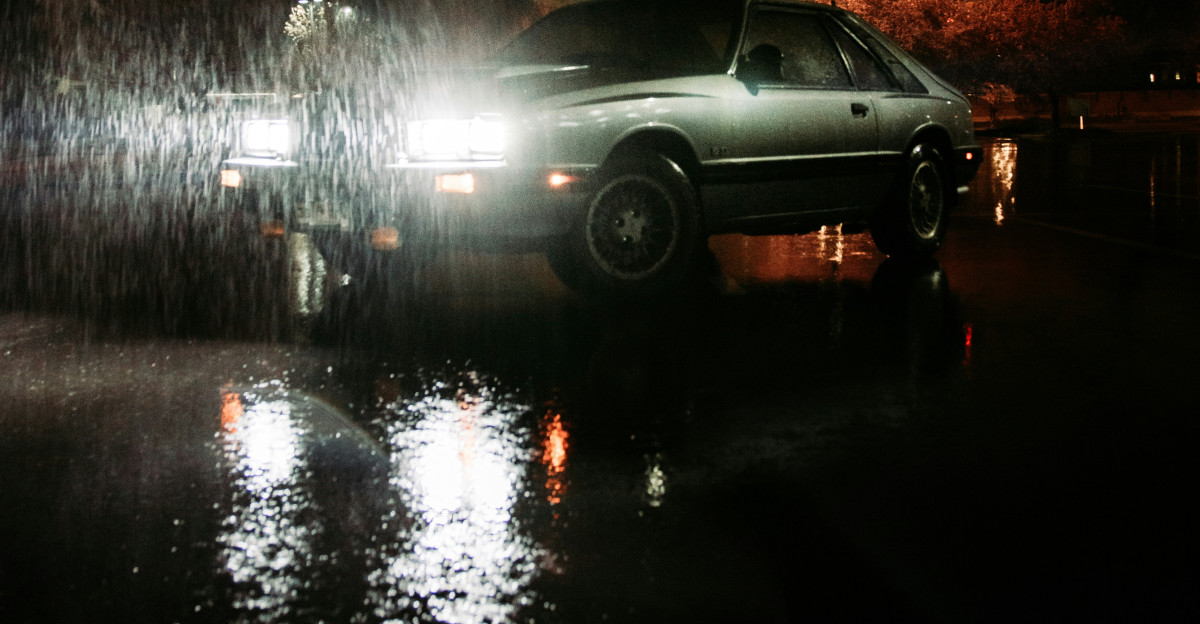 black suv on road during night time