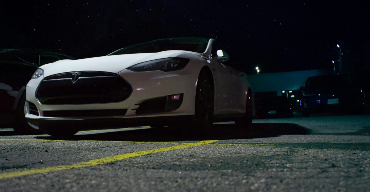 black lamborghini aventador on road during night time