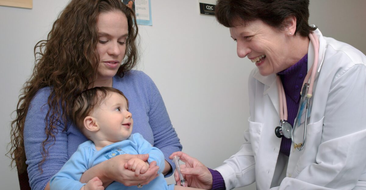 a young child is being examined by a doctor
