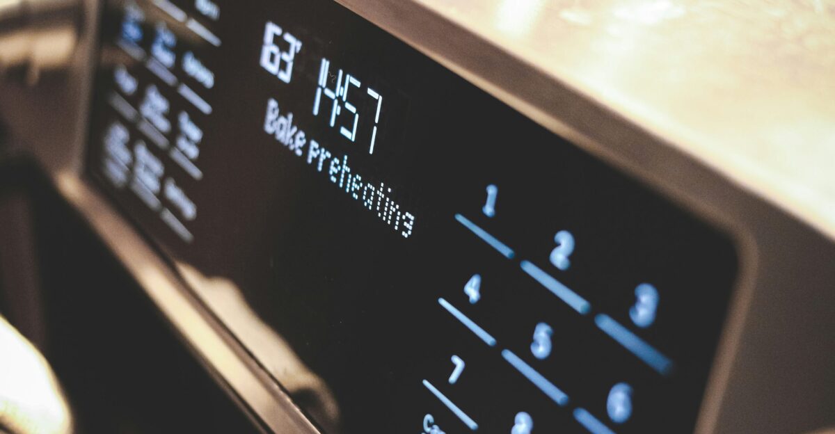 a close up of a microwave with buttons and numbers