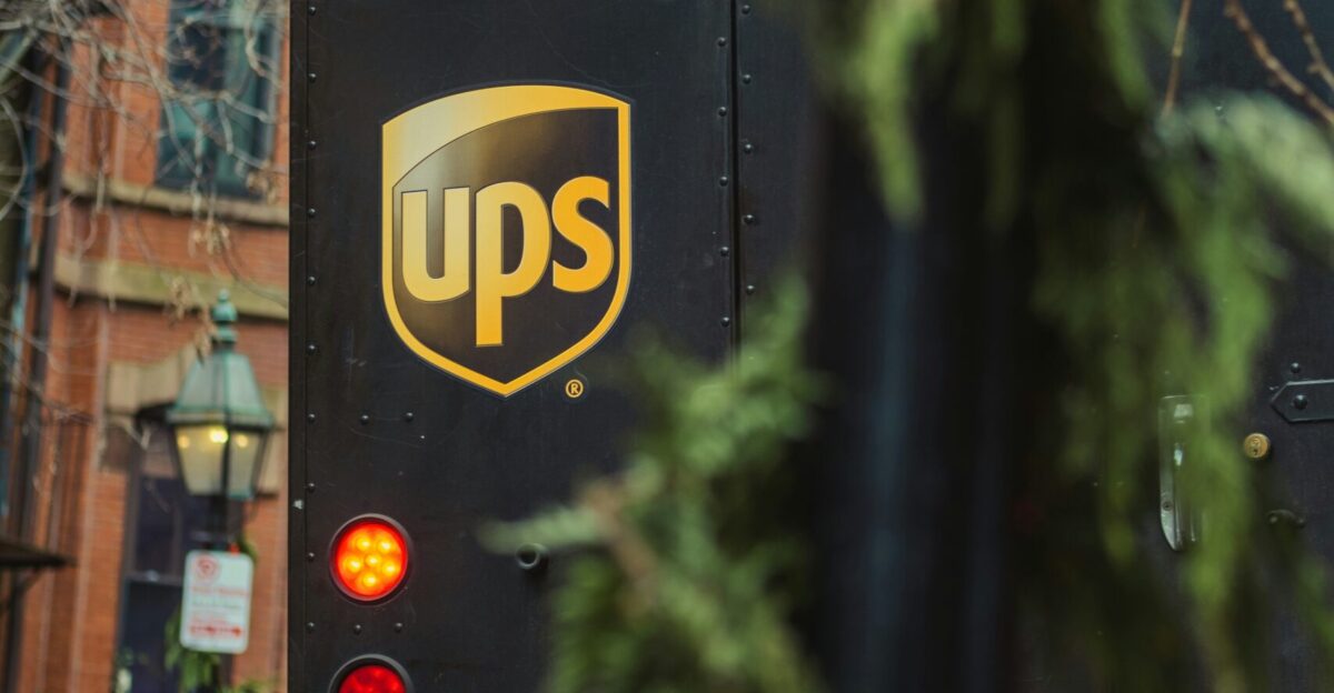 a ups bus parked on the side of the road