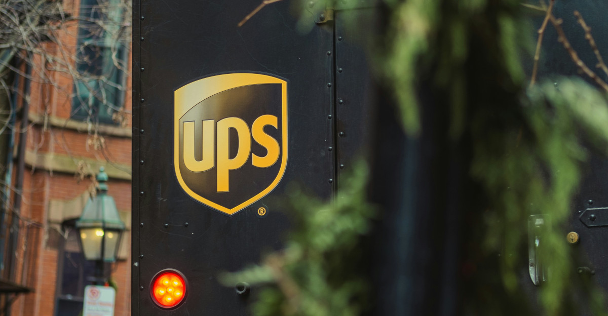 a ups bus parked on the side of the road