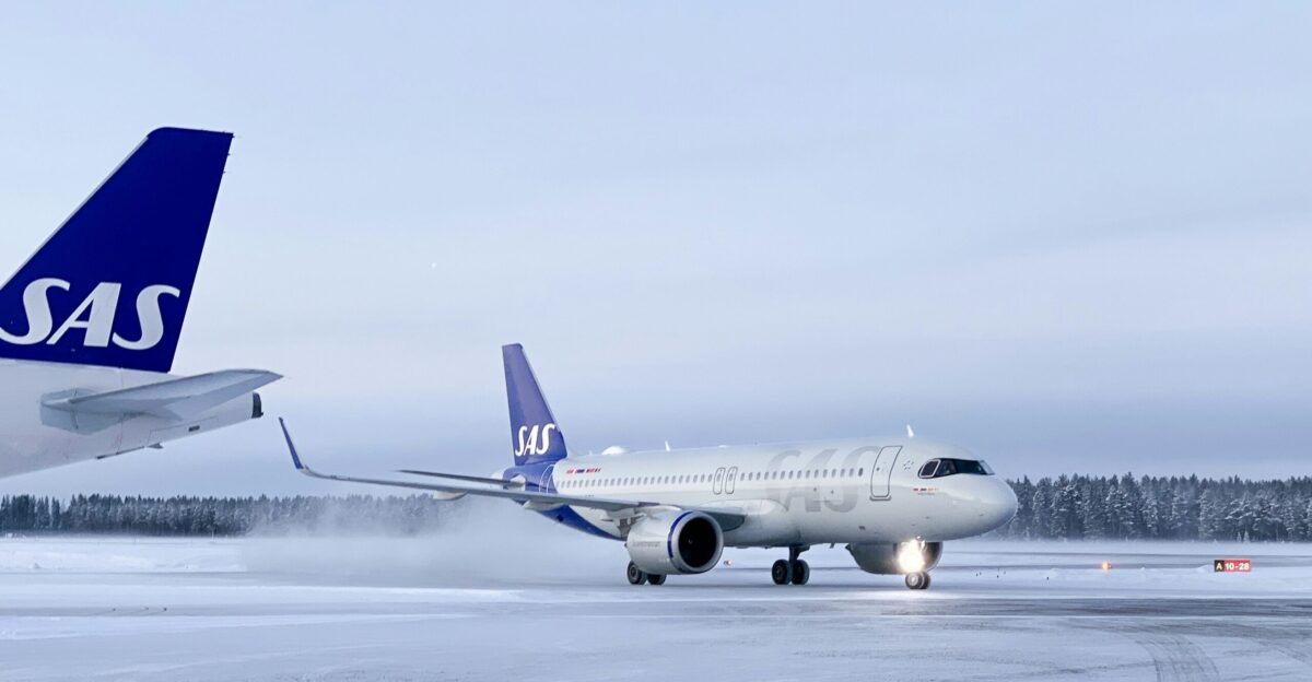 a large jetliner sitting on top of an airport tarmac