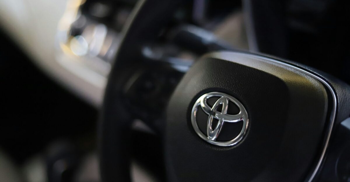 a close up of a steering wheel of a car