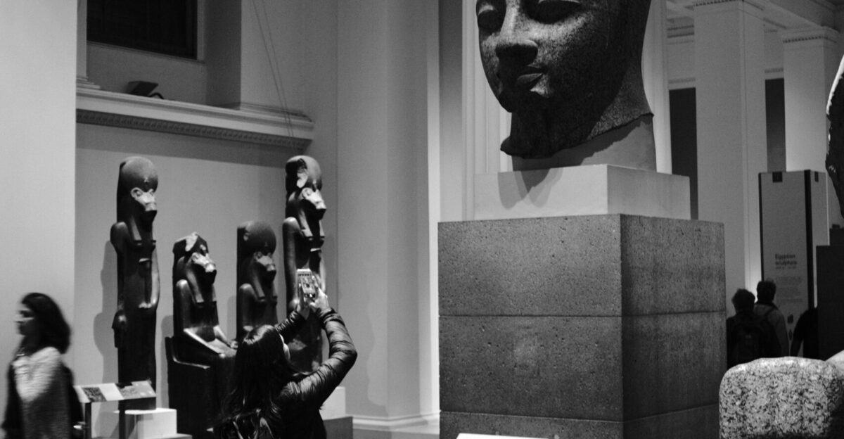 a statue of a man holding a gun