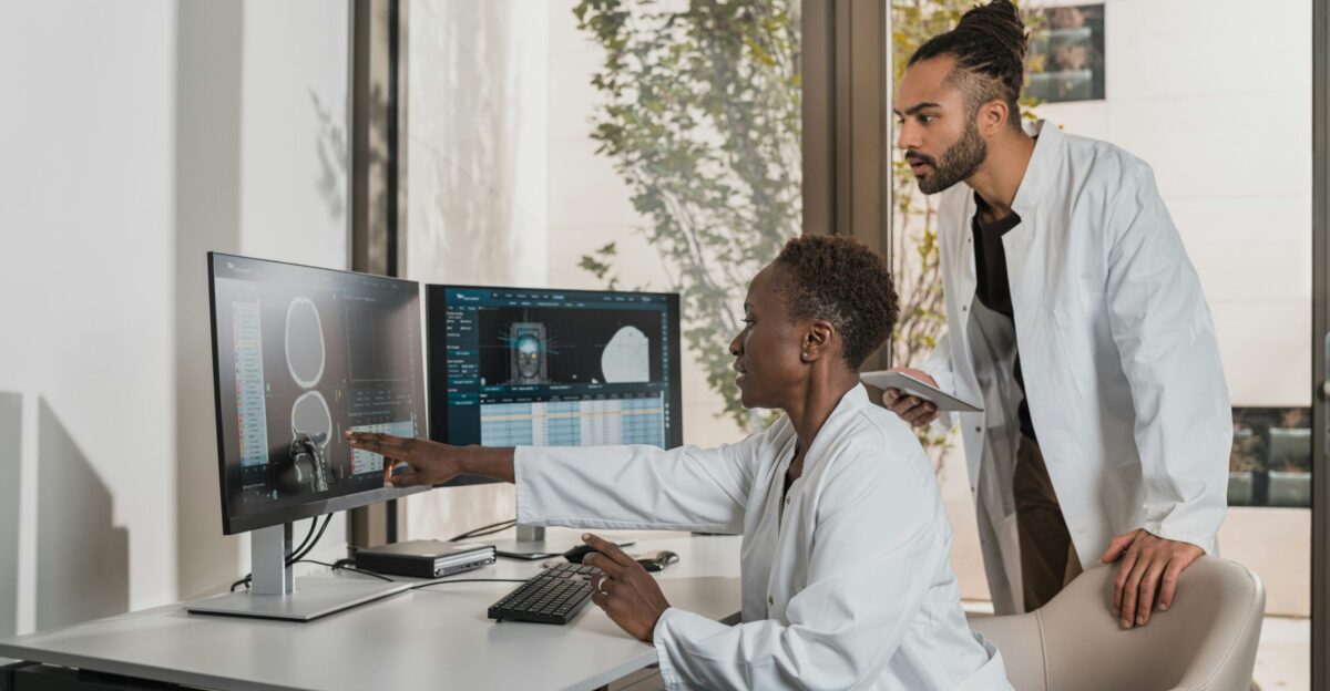 a man showing something on the computer