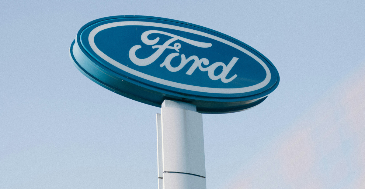 a ford sign is shown against a blue sky