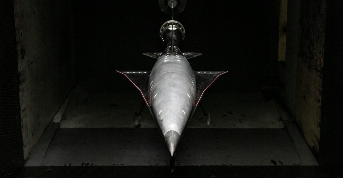 an airplane is shown in a dark room