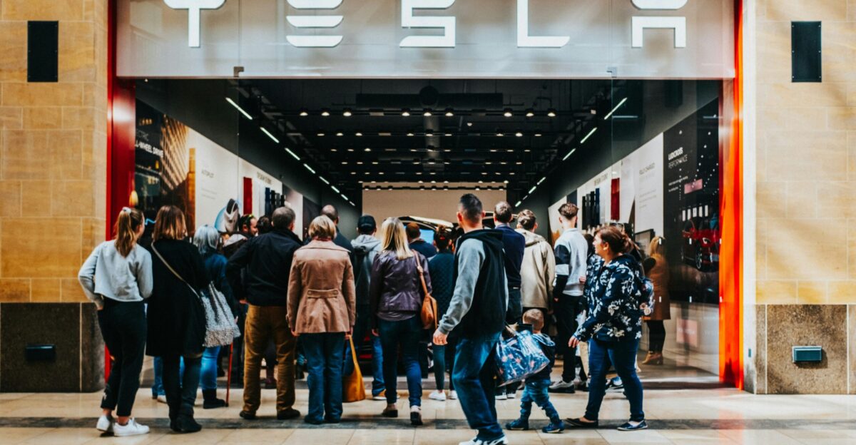 a group of people standing outside of a building