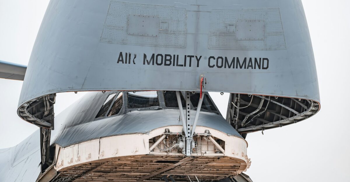 a close up of the side of an air mobility command plane