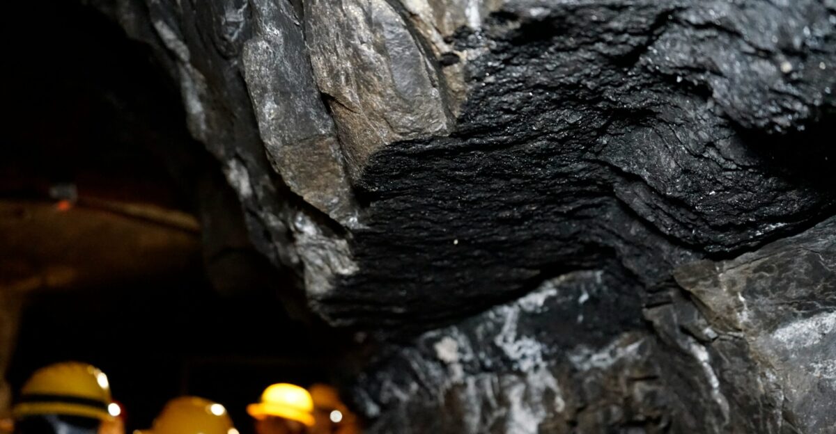 a group of people standing in a cave