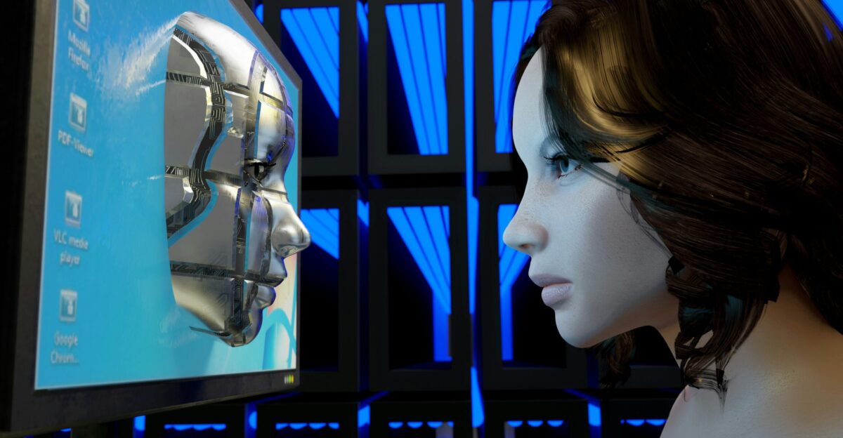 a female mannequin is looking at a computer screen