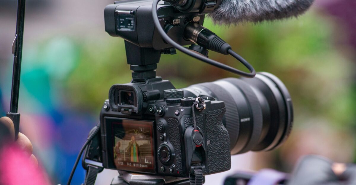 a camera with a microphone attached to it