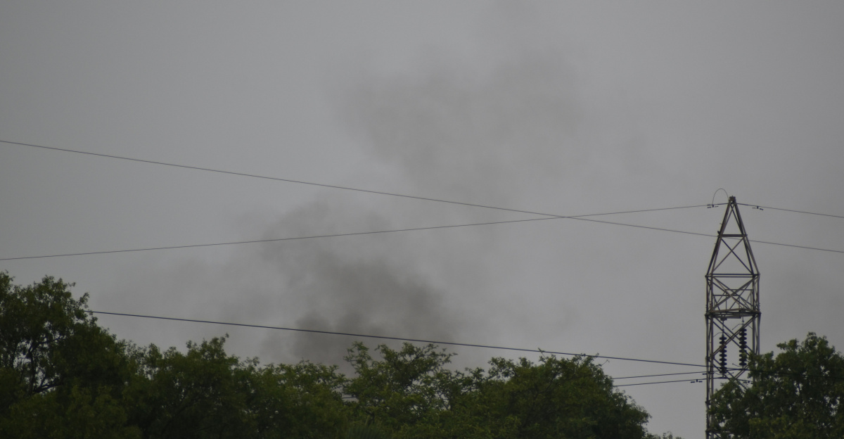 the smoke is coming out of the chimney