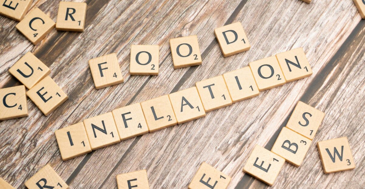 scrabble tiles spelling out food information on a wooden table